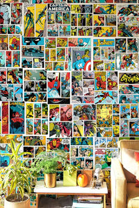 Marvel & DC comics posters collage kit in living room behind a couch