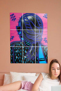 girl with shorts lying on bed with big poster on wall behind