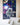 block kit astronaut poster on the wall behind bed
